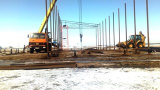 Аренда экскаватора погрузчика с ямобуром в Мыски цена от 1576 руб