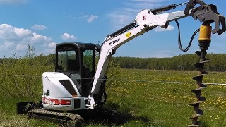 Аренда экскаватора погрузчика с ямобуром в Мыски цена от 1576 руб